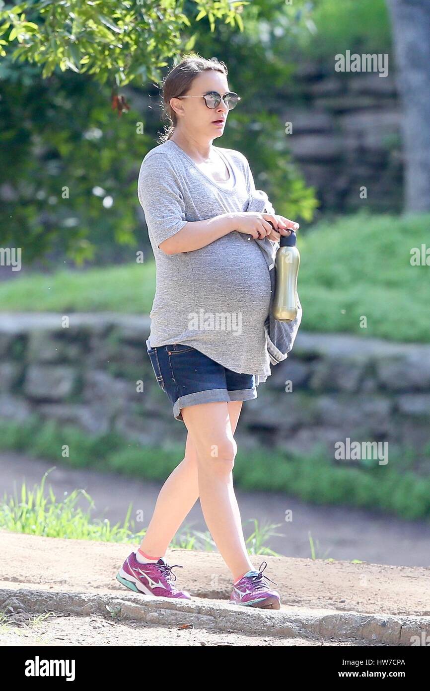 Pregnant Natalie Portman shows off her baby bump while out hiking with