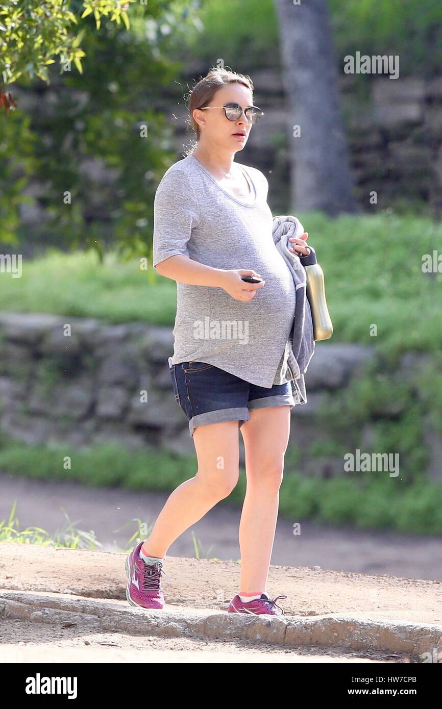 Pregnant Natalie Portman shows off her baby bump while out hiking 