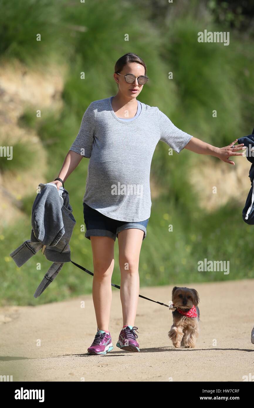 Pregnant Natalie Portman shows off her baby bump while out hiking with