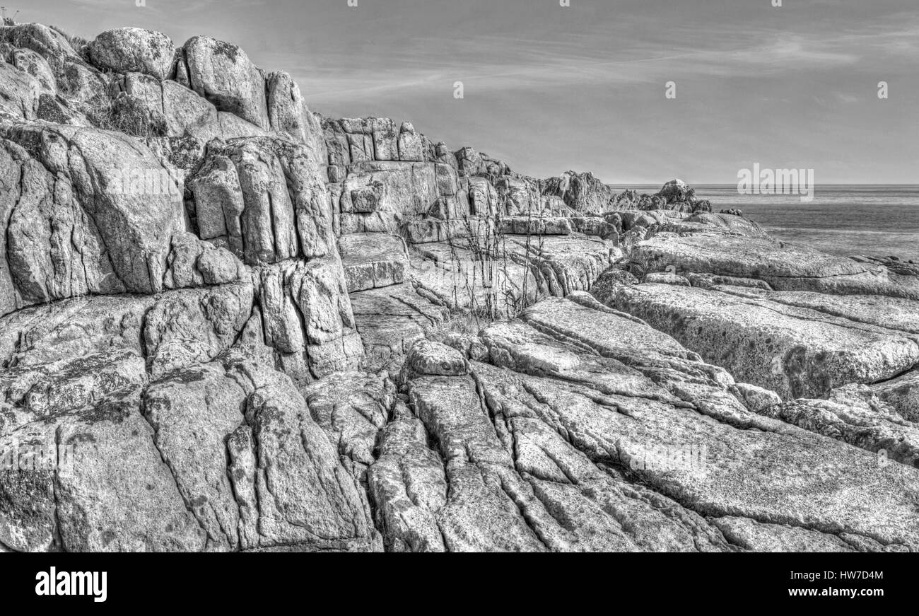 Beautiful landscape on rocky shore in black and white Stock Photo - Alamy