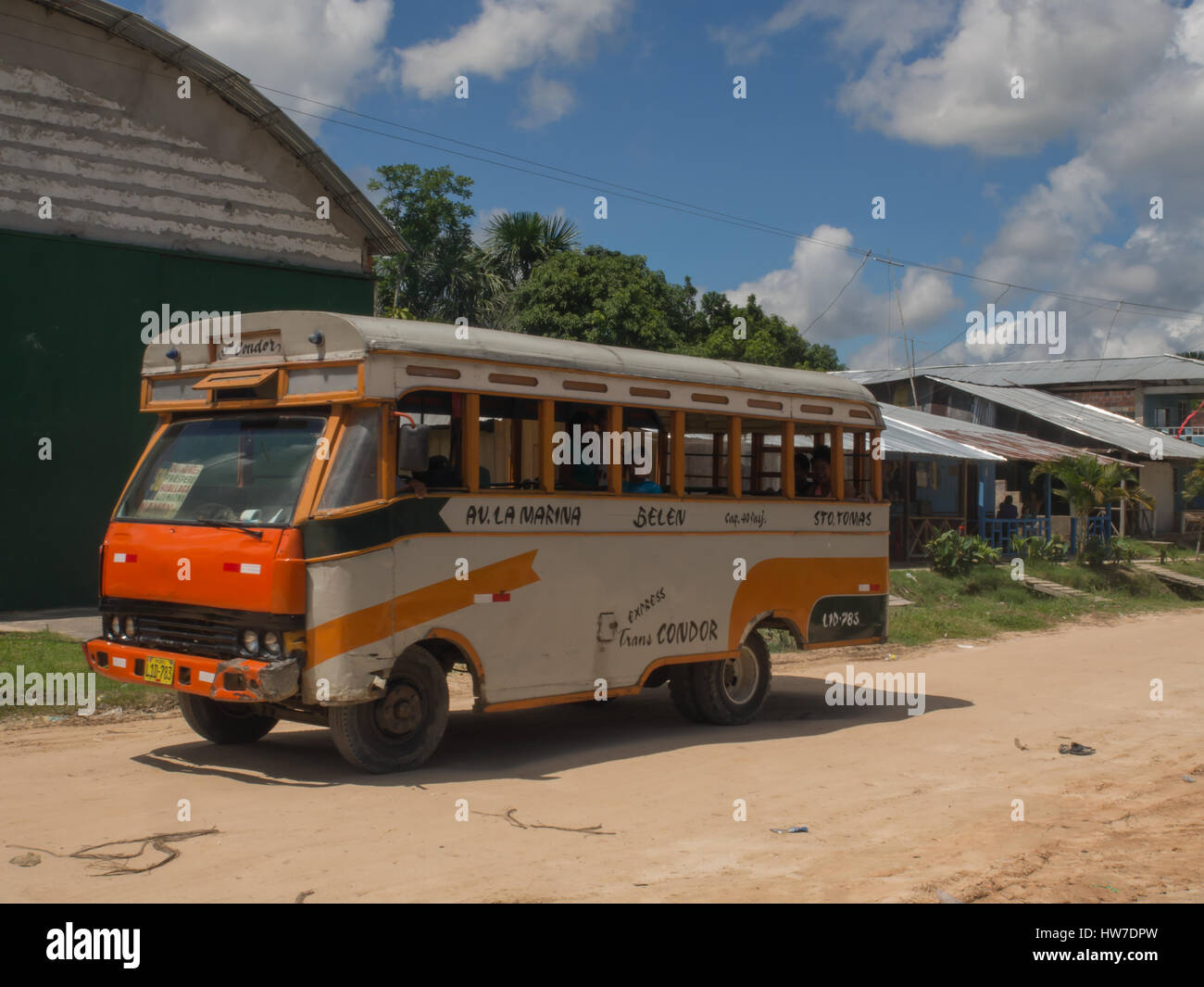Santo Tomas, Peru  - May 17, 2016: Corolful bus on street of a small southern town. Stock Photo