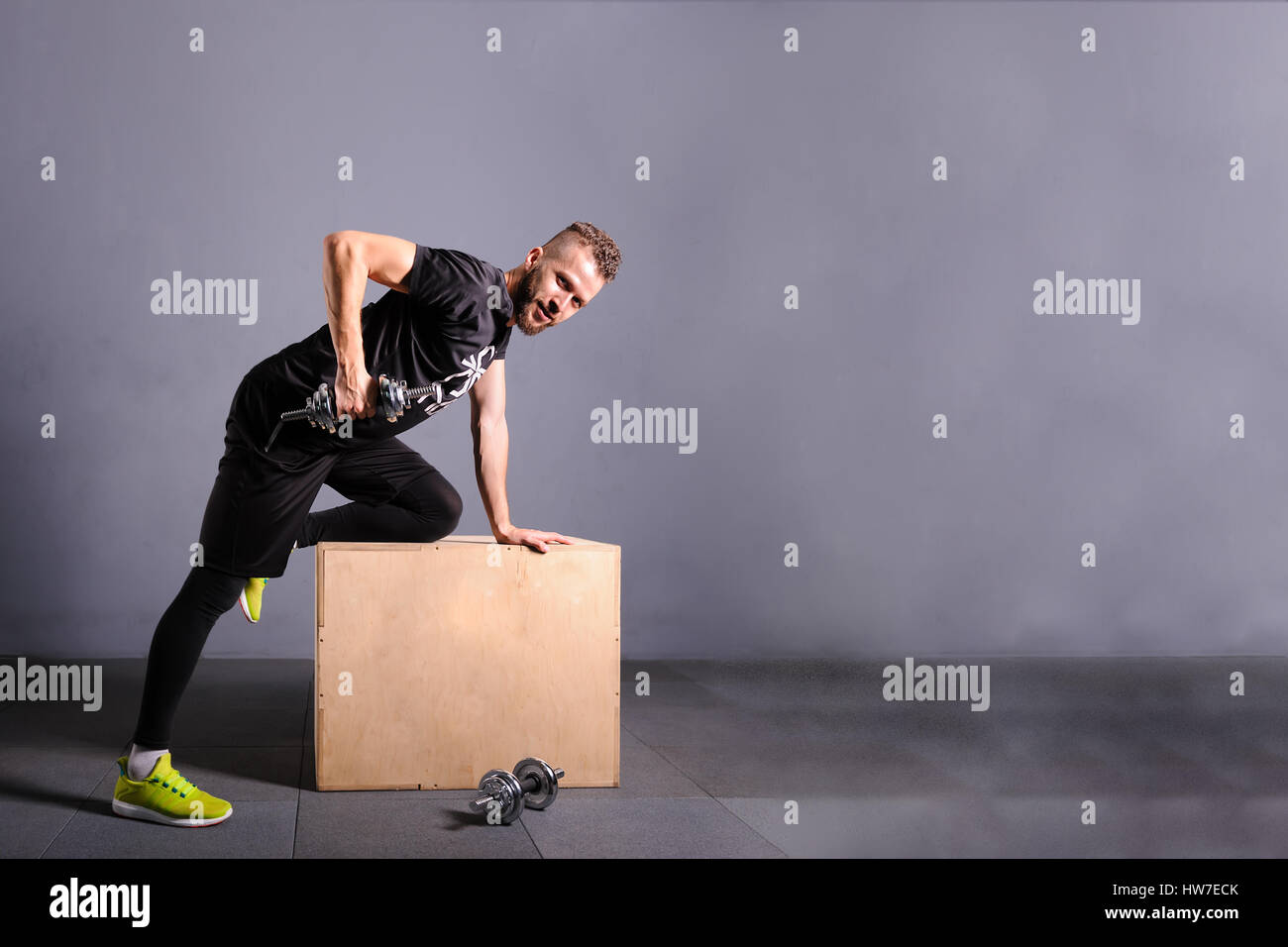 Man raising a dumbbell Copy space Stock Photo