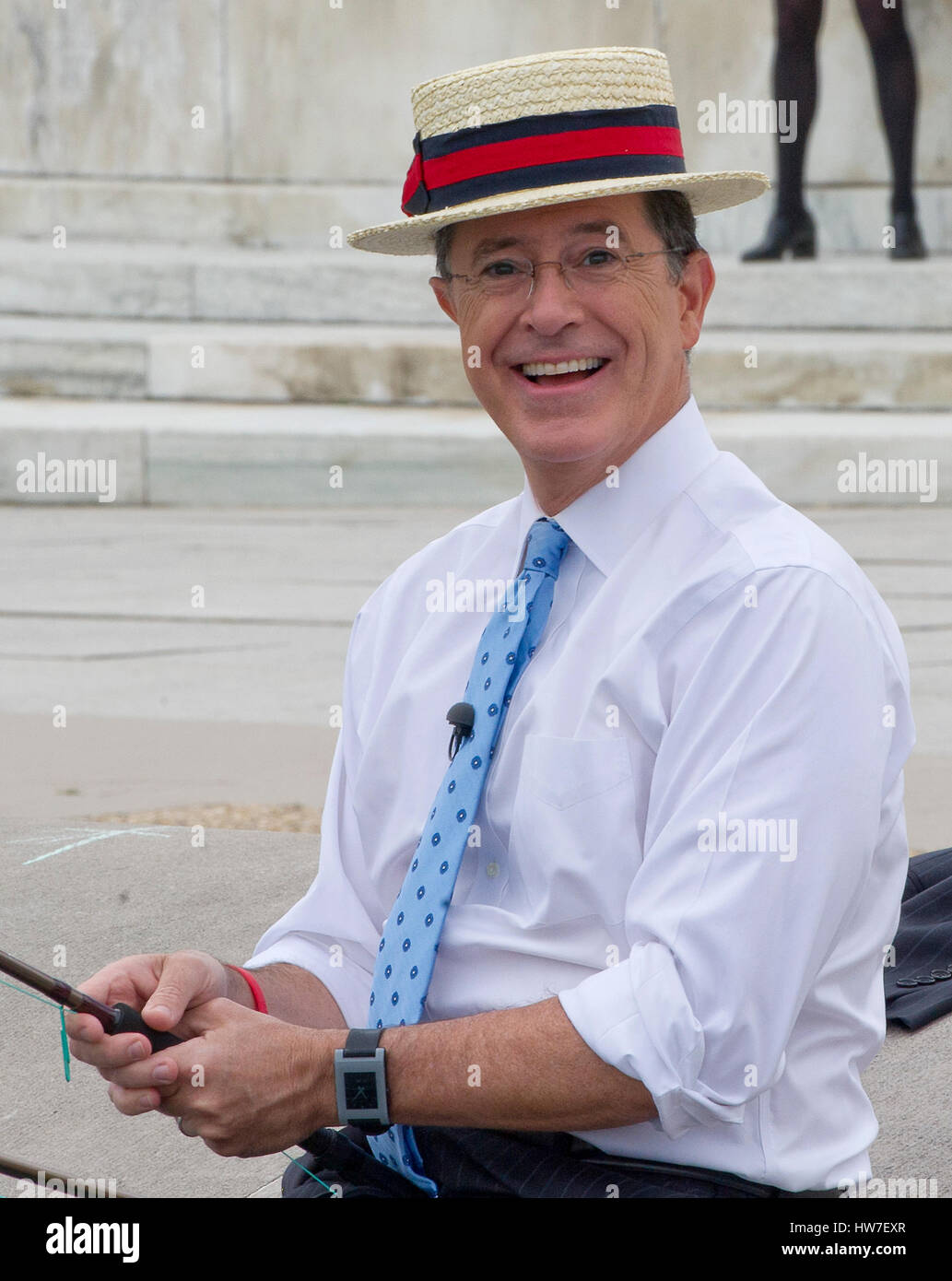 Stephen Colbert host of the Comedy Central show 'The Colbert Report' works on bit around the the U.S. Capitol Reflecting Pool in Washington D.C. on Friday October 3 2014. Credit: Ron Sachs / CNP (RESTRICTION: NO New York or New Jersey Newspapers or newspa Stock Photo