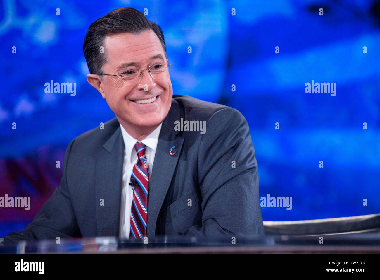 Television personality Stephen Colbert smiles while taping the 'The Colbert Report' with United States President Barack Obama not pictured in Lisner Auditorium on the campus of George Washington University in Washington D.C. U.S. on Monday December 8 2014 Stock Photo