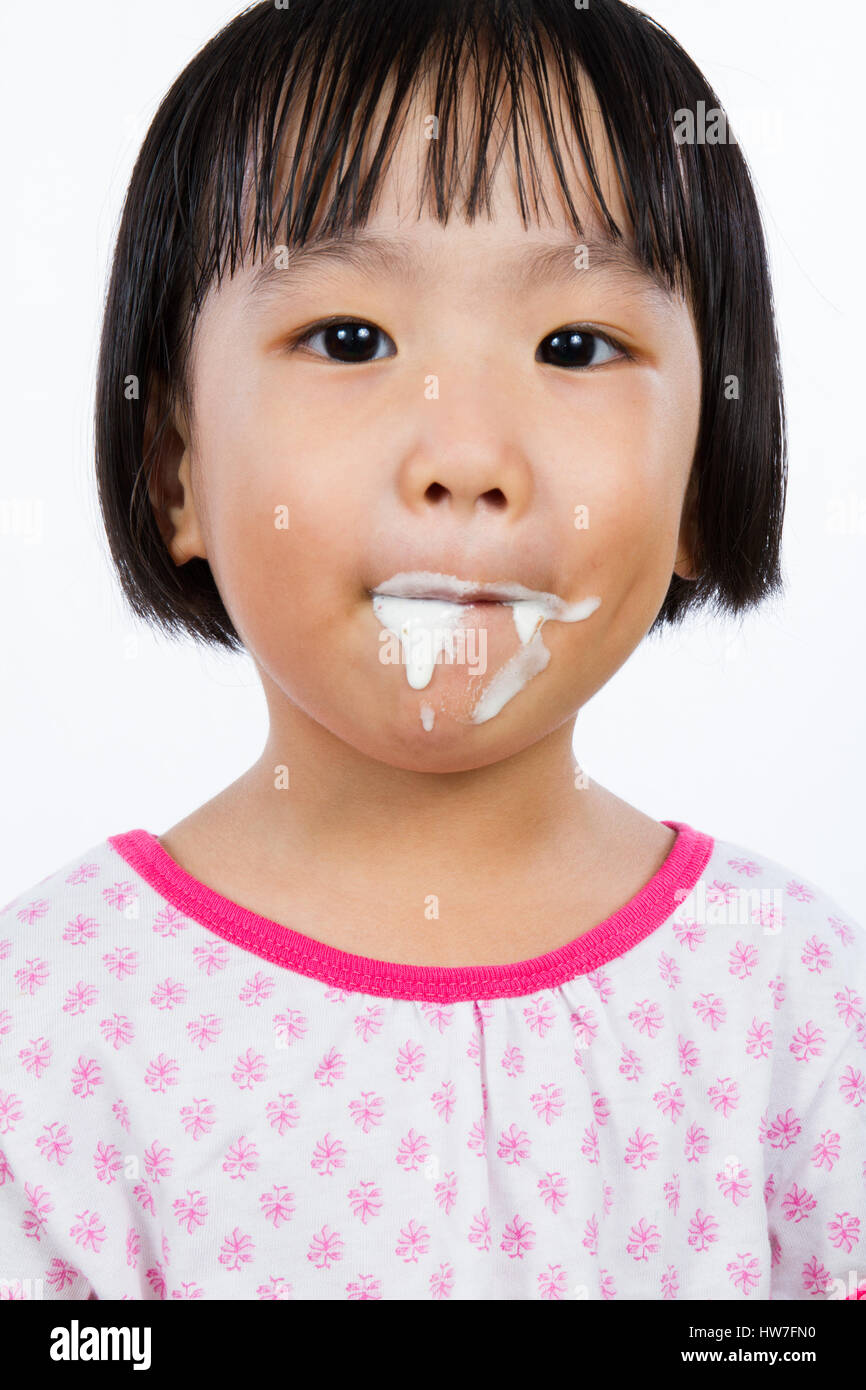 Asian Little Chinese Girl Eating Ice Cream isolated on White Background  Stock Photo - Alamy