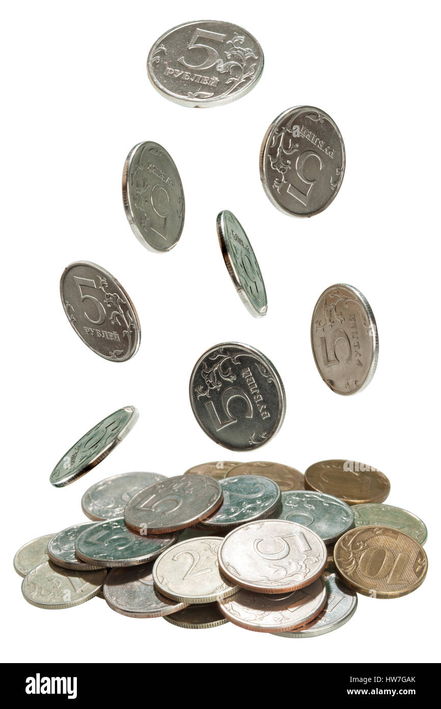 Coins falling into a pile on white Stock Photo - Alamy