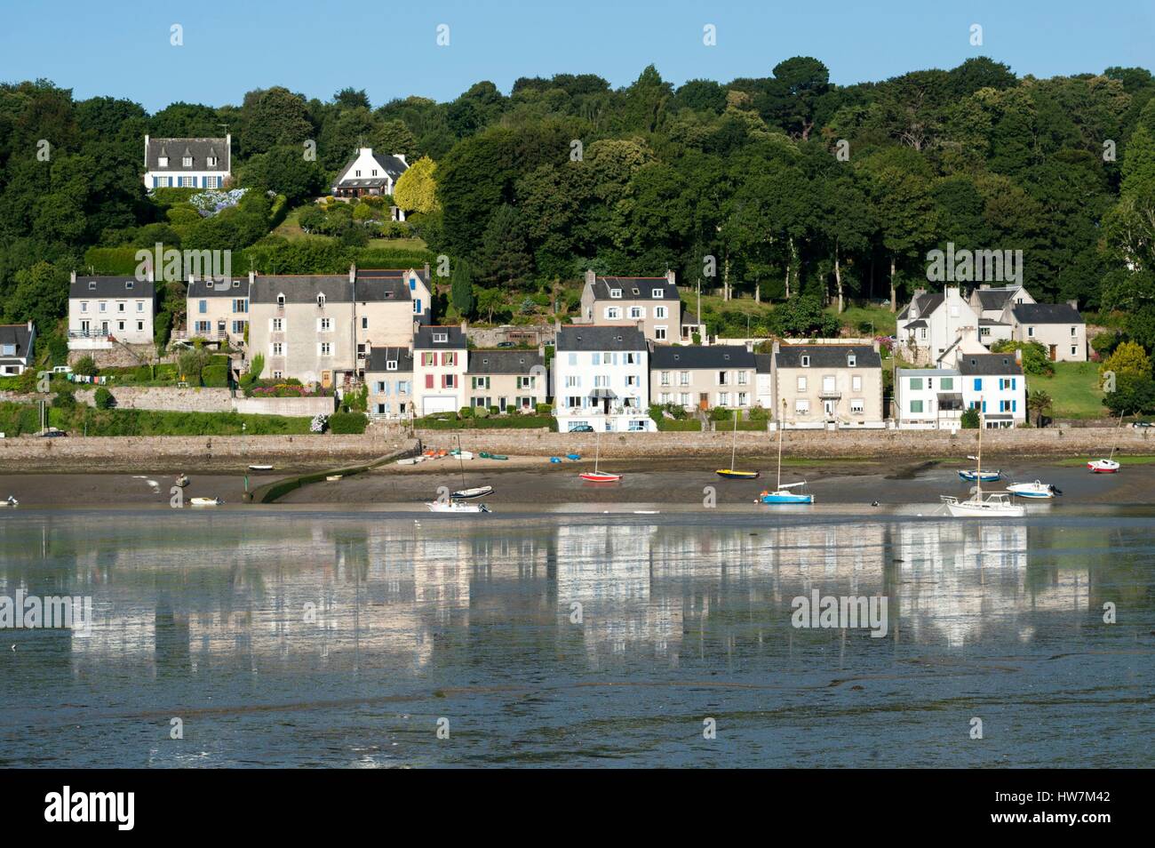 France, Finistere, Locquenole, houses reflected in the river Dourduff Stock Photo