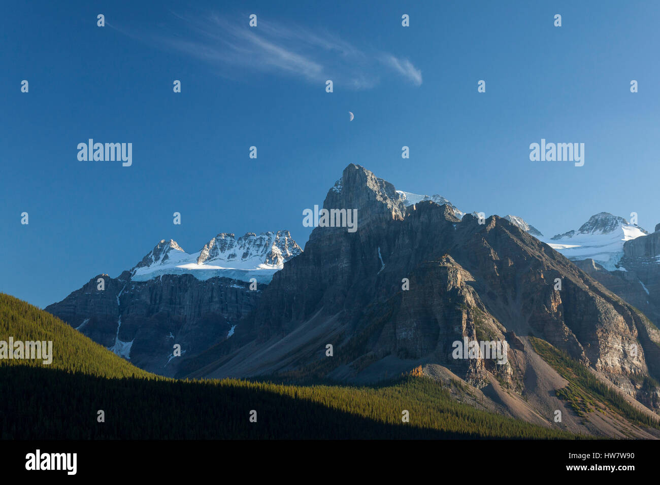 Moon over Mount Temple in Banff National Park, Canada. Stock Photo