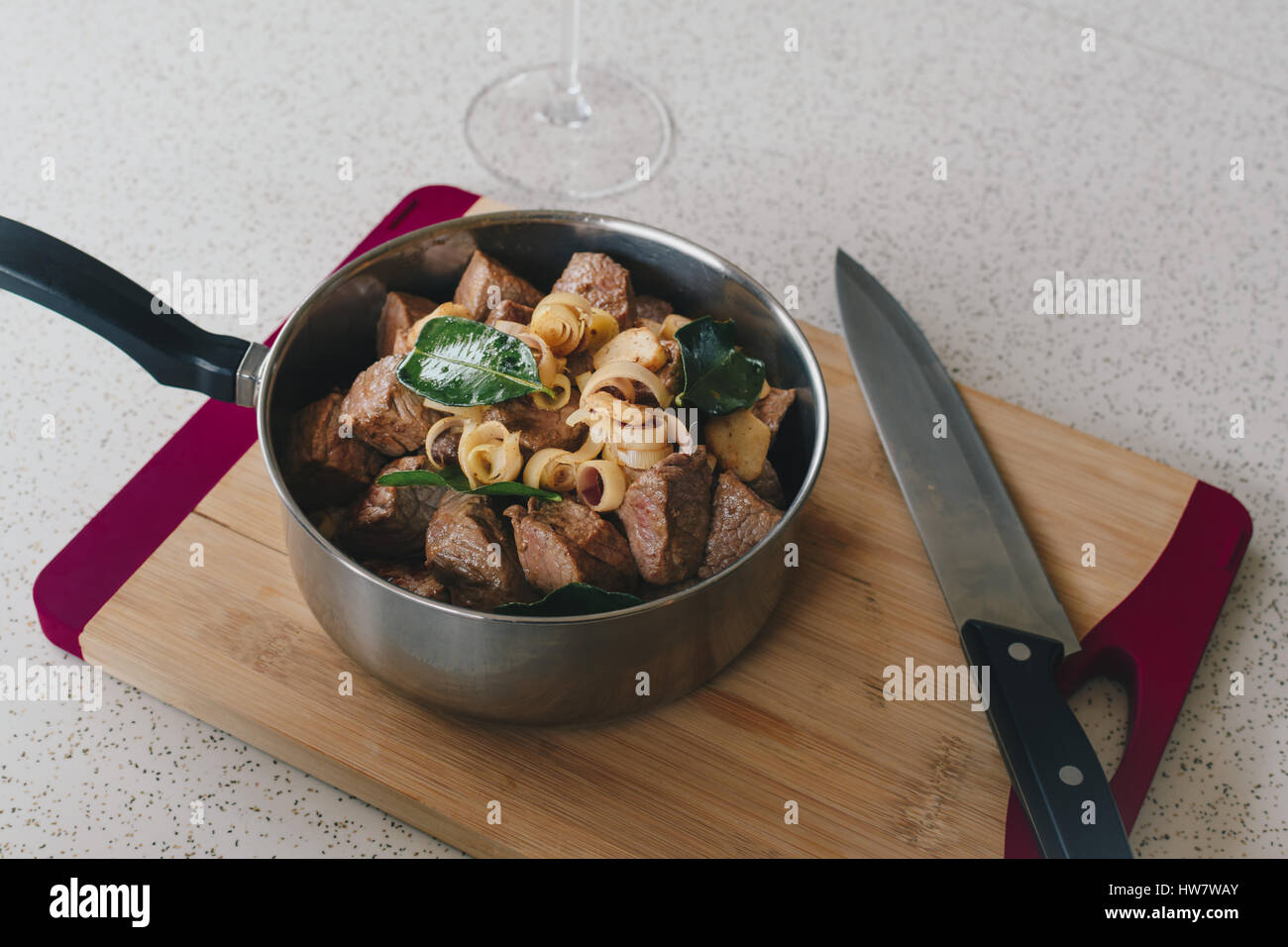 braised beef in pot on table Stock Photo