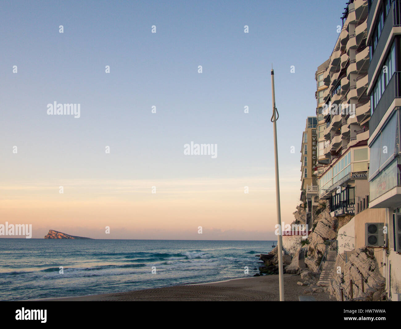 The facade of hotels, in Benidorm's Old Town, look out towards the iconic Benidorm Island. Stock Photo