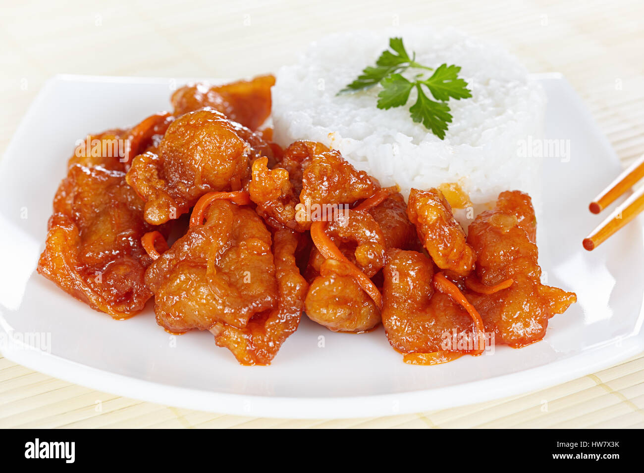 Chinese cuisine. Pork in batter and sweet and sour sauce Stock Photo
