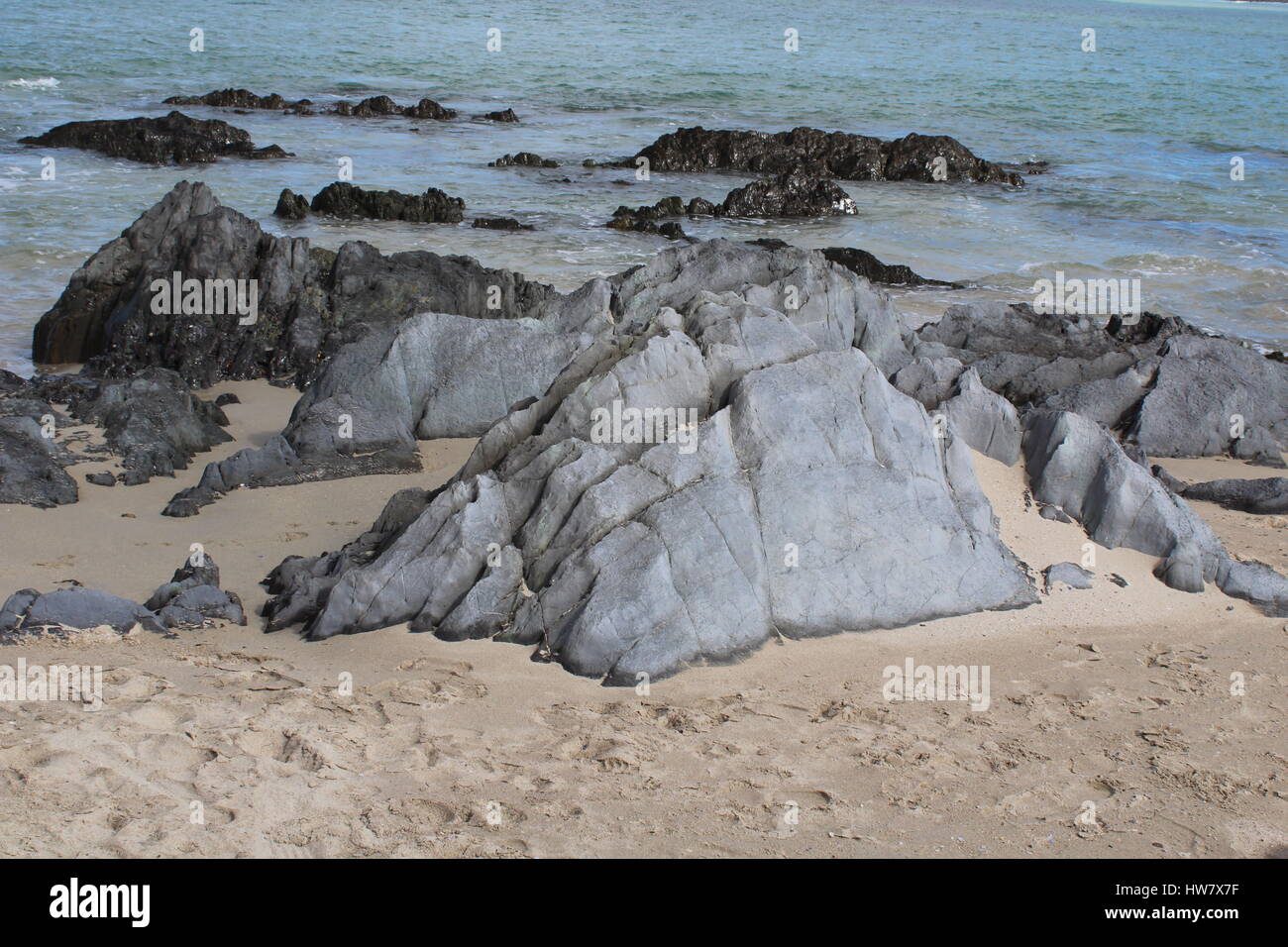 Rock formations at Gordons Bay beach, Western Cape, South Africa Stock Photo