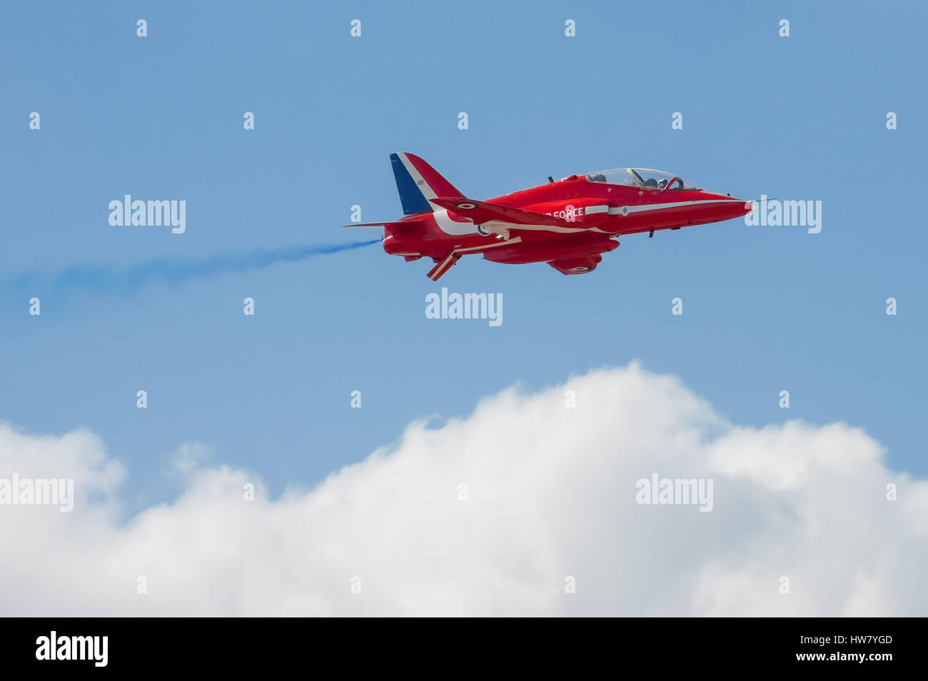 Farnborough, UK - July 15, 2010: Low level pass by a Red Arrows aerobatic display jet during the Farnborough International Airshow, UK Stock Photo
