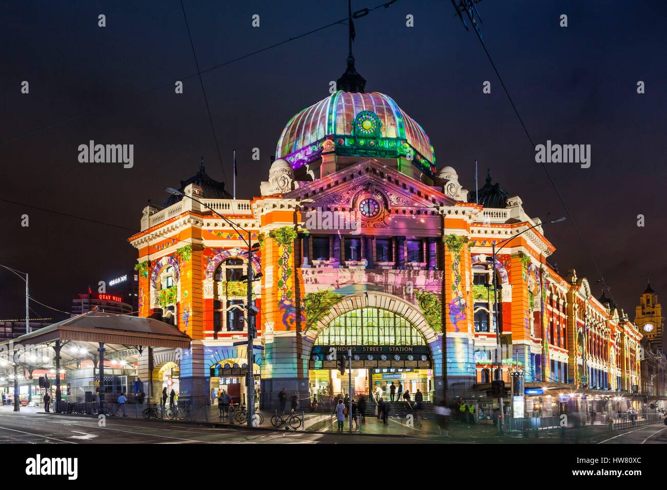 Australia, Victoria, Melbourne, Flinders Street Train Station, lit with projected laser designs, White Nights Festival Stock Photo