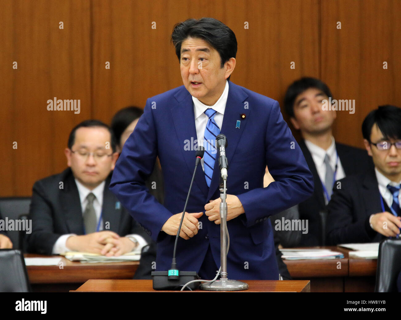 Tokyo, Japan. 17th Mar, 2017. Japanese Prime Minister Shinzo Abe answers a question by an opposition lawmaker at the Lower House's foreign affairs committee session at the National Diet in Tokyo on Friday, March 17, 2017. Abe is now center in a land deal scandal of a Osaka elementary school as he donated to the school operator Yasunori Kagoike, news reported. Credit: Yoshio Tsunoda/AFLO/Alamy Live News Stock Photo