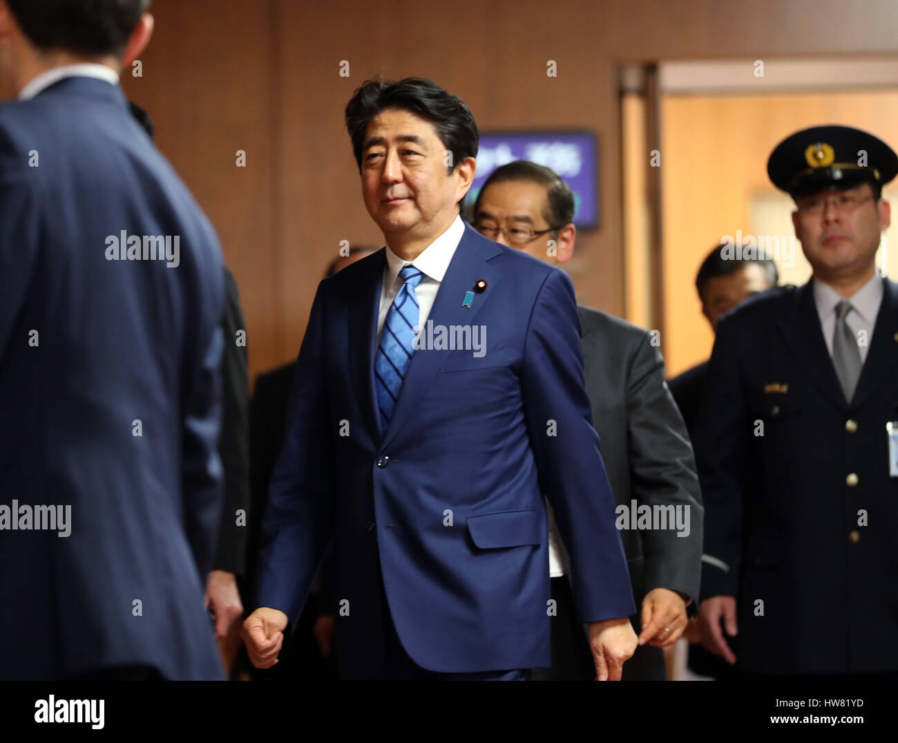 Tokyo, Japan. 17th Mar, 2017. Japanese Prime Minister Shinzo Abe leaves the Lower House's foreign affairs committee session at the National Diet in Tokyo on Friday, March 17, 2017. Abe is now center in a land deal scandal of a Osaka elementary school as he donated to the school operator Yasunori Kagoike, news reported. Credit: Yoshio Tsunoda/AFLO/Alamy Live News Stock Photo