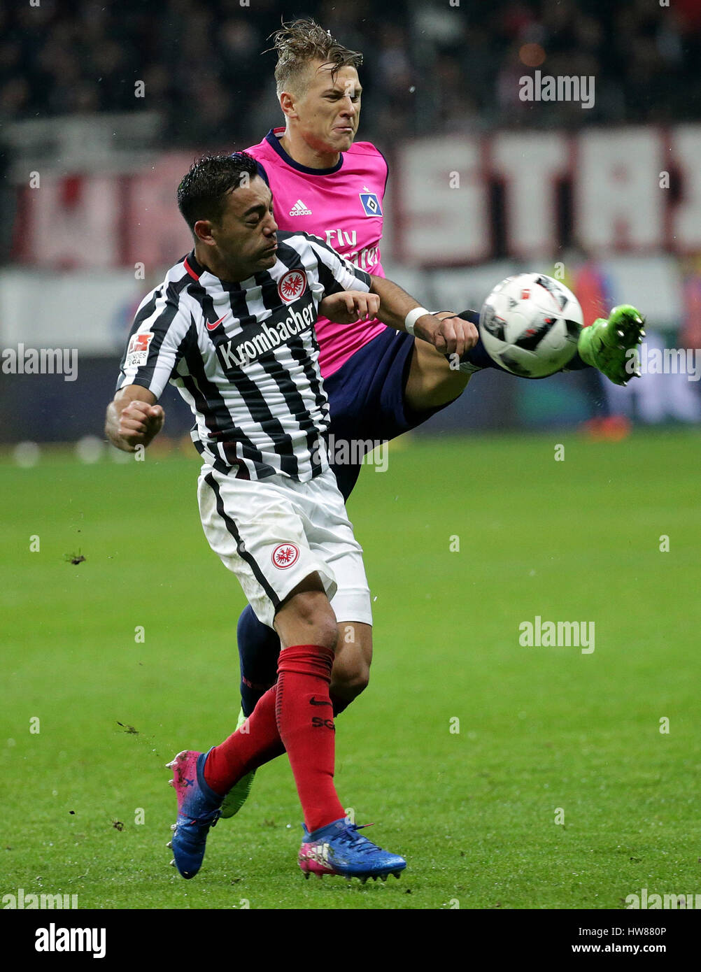 Frankfurt's Marco Fabian (l) and Hamburg's Matthias Ostrzolek in action during the Bundesliga soccer match between Eintracht Frankfurt and Hamburger SV at the Commerzbank-Arena in Frankfurt/Main, Germany, 18 March 2017. (EMBARGO CONDITIONS - ATTENTION: Due to the accreditation guidlines, the DFL only permits the publication and utilisation of up to 15 pictures per match on the internet and in online media during the match.) Photo: Hasan Bratic/dpa Stock Photo