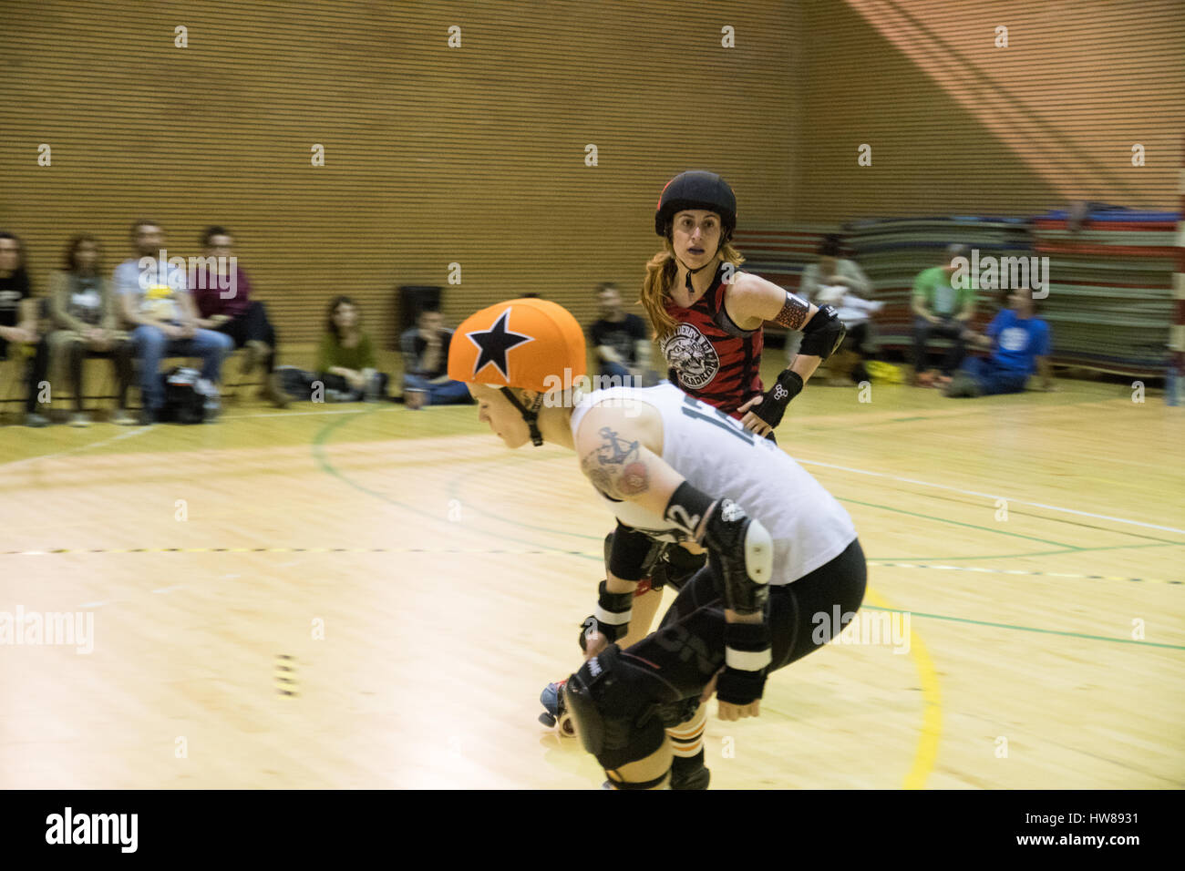 Madrid, Spain. 18th March, 2017. Jammer of Roller Derby Madrid A, #15 Furia  Poligonera, ending the jam just before the jammer of Oslo Roller Derby  Klubb, #12 Eda Lyngra, reach her. ©