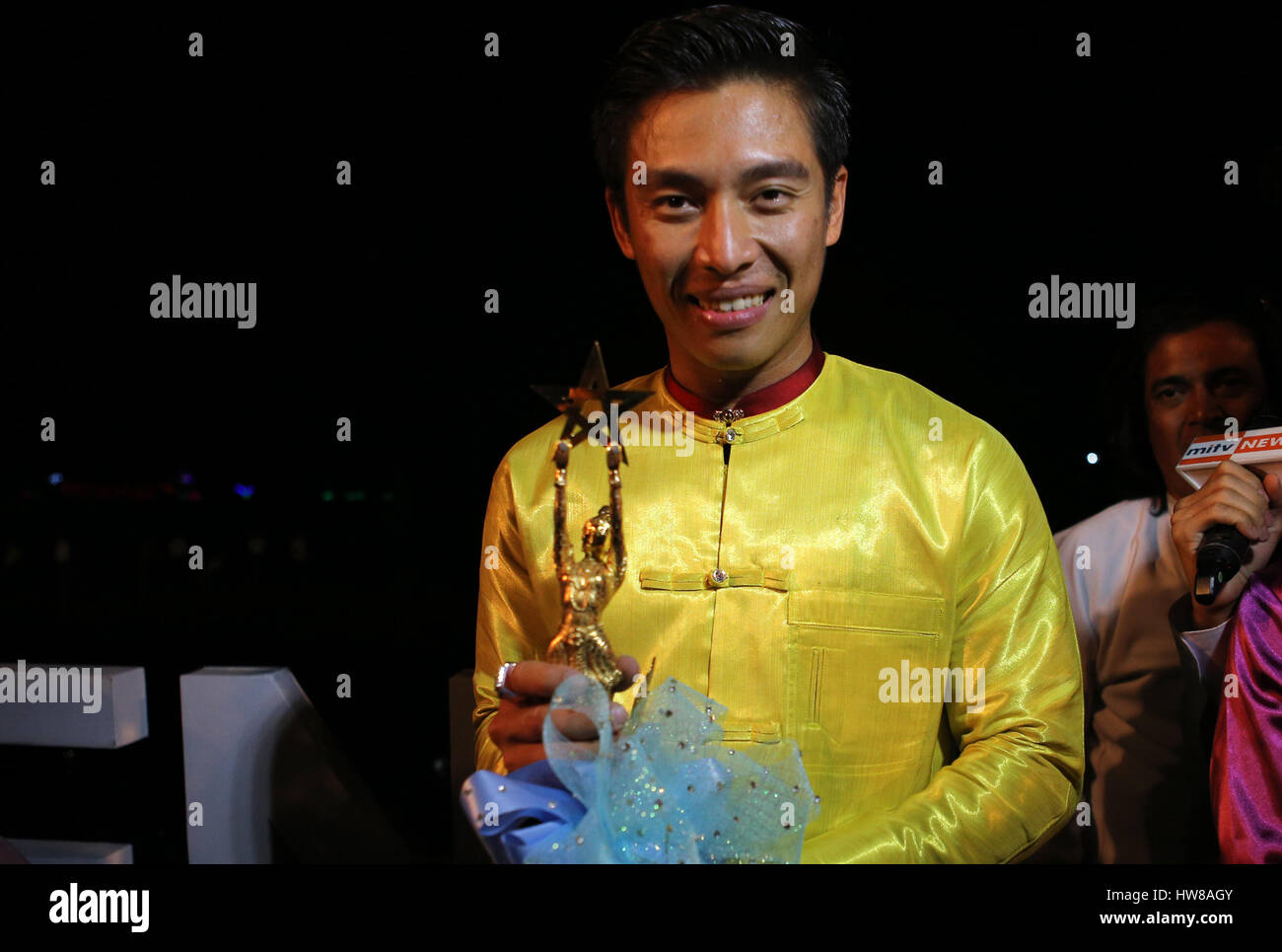 Yangon, Myanmar. 18th Mar, 2017. The best actor winner Tun Tun poses