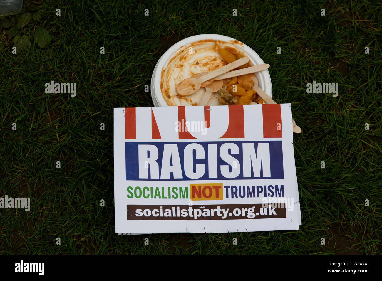 London, UK. 18th March 2017. The newspaper headline 'Not Racism' is lying on the ground during the UN Anti-Racism Day in London, UK. Stock Photo