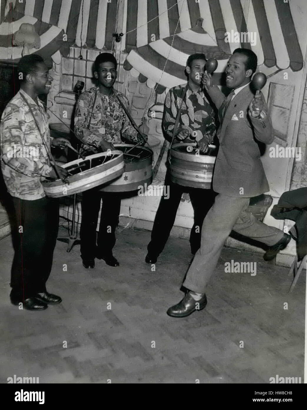 1955 - McDonald Bailey wants to put ''Steel Bands'' on the map : Famous athletic McDonald Balley who had done so much for sport and a lot in putting Trinidad on the map in the field of Athletics - is new very keen that people should know more of the culture of his county. For that reason he is encouraging the Trained All-Steel orchestra and has offered to appear with them on T.V. The All-Steel orchestra is something that comes exclusively from Tragedian. It was born in the Island's slums. when the boys, having no work or money and yet wanting to indulge in their inherited love of music made dr Stock Photo