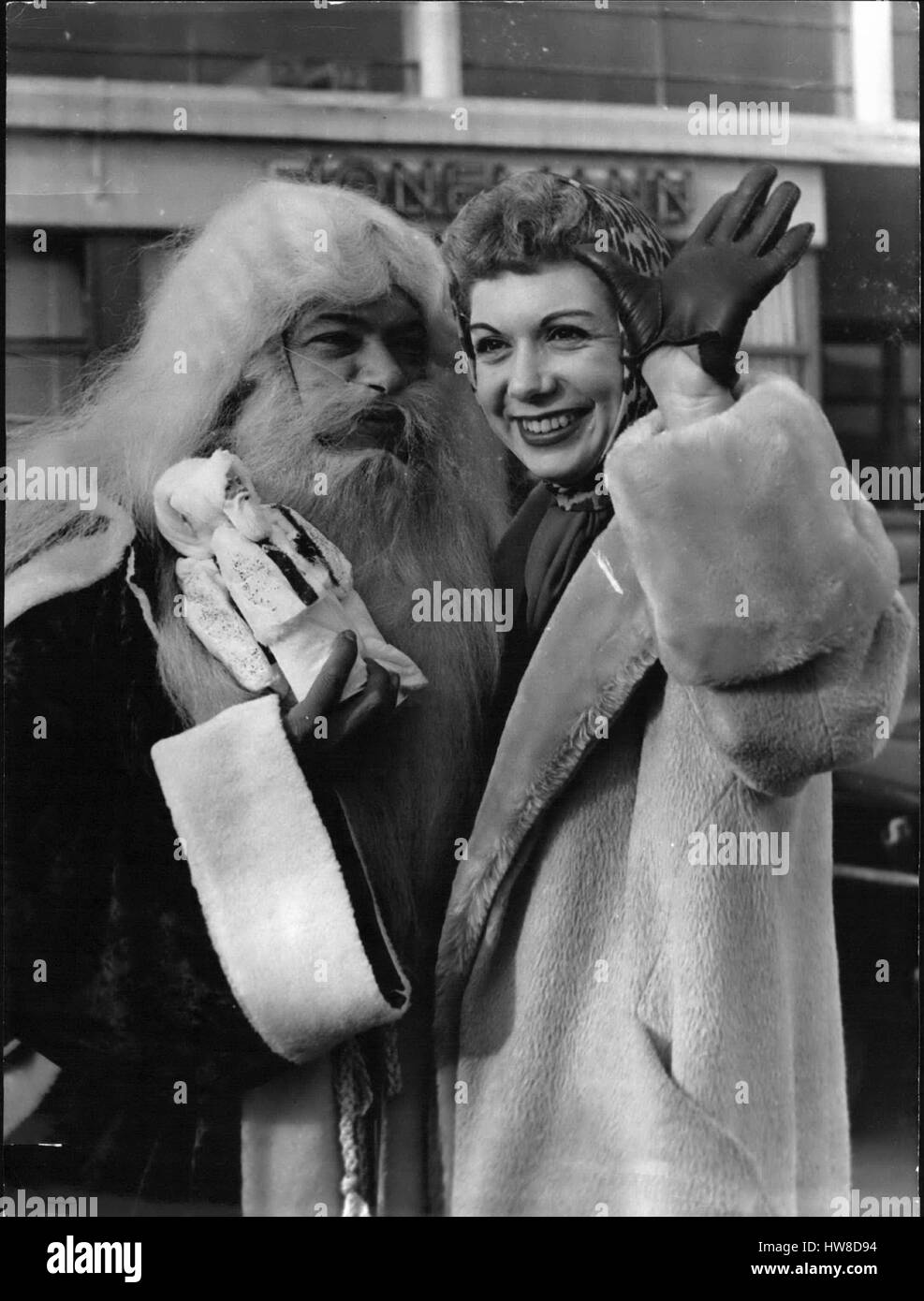 Dec. 12, 1958 - Father Christmas welcomes french star : The Famous French singer, Jacqueline Francois, arrived from New-york in Paris To -day. The French singer Henri Salvador Dressed in ''Father Christmas'' welcomed her at the airport. photo shows Henri Salvador and Jacqueline Francois photographed at the Bourget. (Credit Image: © Keystone Press Agency/Keystone USA via ZUMAPRESS.com) Stock Photo