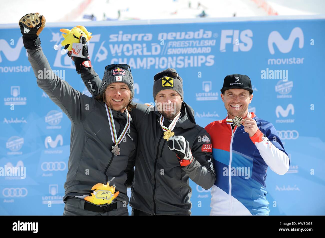 Sierra Nevada, Spain. 16th Mar, 2017. (L-R) Benjamin Karl, Andreas Prommegger (AUT), Nevin Galmarini (SUI) Snowboarding : Gold medalist Andreas Prommegger of Austria, silver medalist Benjamin Karl of Austria and bronze medalist Nevin Galmarini of Switzerland pose with their medals during the medal ceremony for the 2017 FIS Snowboard World Championships Men's Parallel Giant Slalom in Sierra Nevada, Spain . Credit: Hiroyuki Sato/AFLO/Alamy Live News Stock Photo