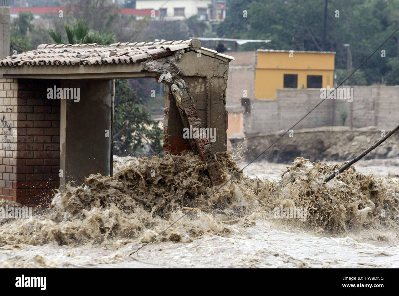 Lima, Peru. 18th Mar, 2017. A house is damaged in the flood in Lima, Peru, on March 18, 2017. Peru is facing a critical situation due to the coastal El Nino phenomenon which has been battering the country with endless rainfall for weeks, causing severe social and economic consequences. Credit: Eddy Ramos/ANDINA/Xinhua/Alamy Live News Stock Photo