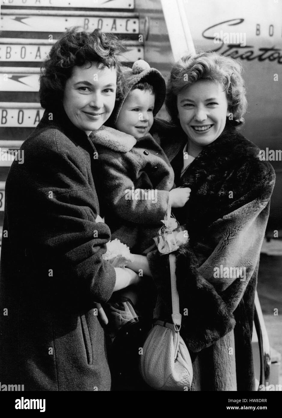 Mar. 28, 1956 - 28-3-56 Ruby Murray returns with her sister Ã¢â‚¬' Popular British singing star, Ruby Murray, arrived at London Airport today with her sister, Mrs. Lilian Duffy, whom she had not seen for 17 years, and LillianÃ¢â‚¬â„¢s little daughter, Janice, 2 &frac12;. After making a three-week American tour, Ruby went to Toronto, Canada, to visit her sister. Mrs. Winifred Murray, their mother, who lives in Belfast, was at the airport to greet them. Keystone Photo Shows: Ruby Murray seen with her sister, Mrs. Lillian Duffy and the latterÃ¢â‚¬â„¢s daughter, Janice, after arrival at London A Stock Photo