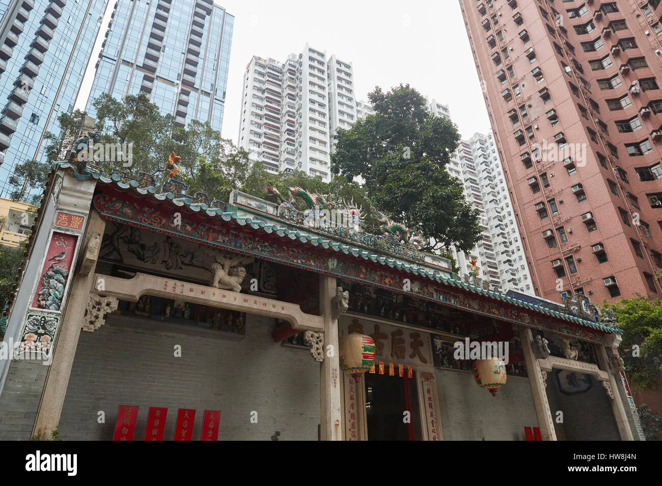 The Historic Tin Hau Temple And The Hong Kong Skyline Behind. Stock Photo