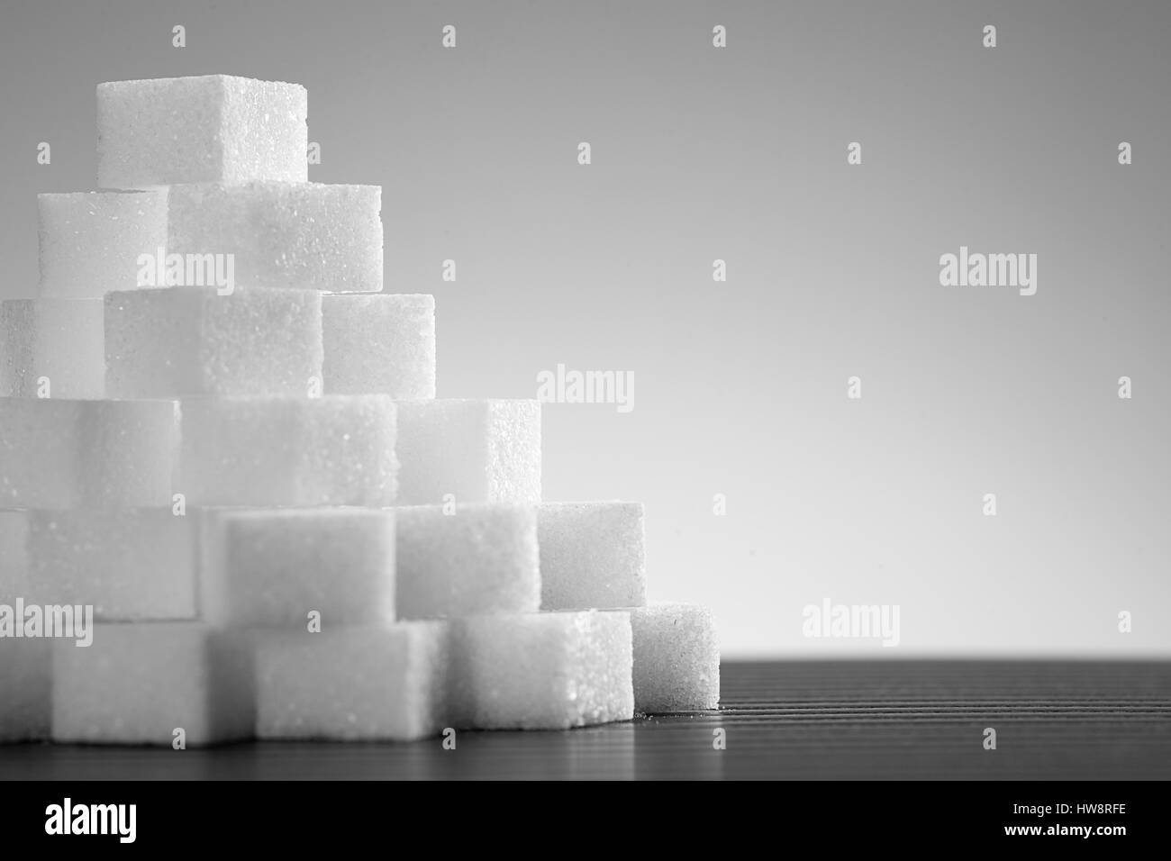 Pile of lump sugar on white background Stock Photo
