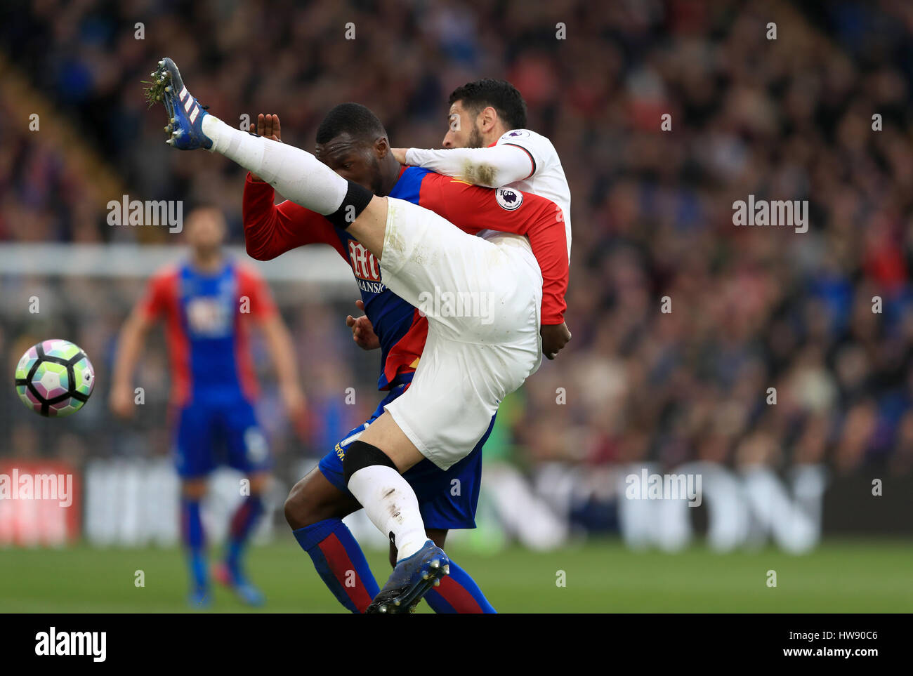 Crystal Palace's Christian Benteke (left) and Watford's Miguel Britos (right) battle for the ball during the Premier League match at Selhurst Park, London. PRESS ASSOCIATION Photo. Picture date: Saturday March 18, 2017. See PA story SOCCER Palace. Photo credit should read: John Walton/PA Wire. RESTRICTIONS: No use with unauthorised audio, video, data, fixture lists, club/league logos or 'live' services. Online in-match use limited to 75 images, no video emulation. No use in betting, games or single club/league/player publications. Stock Photo