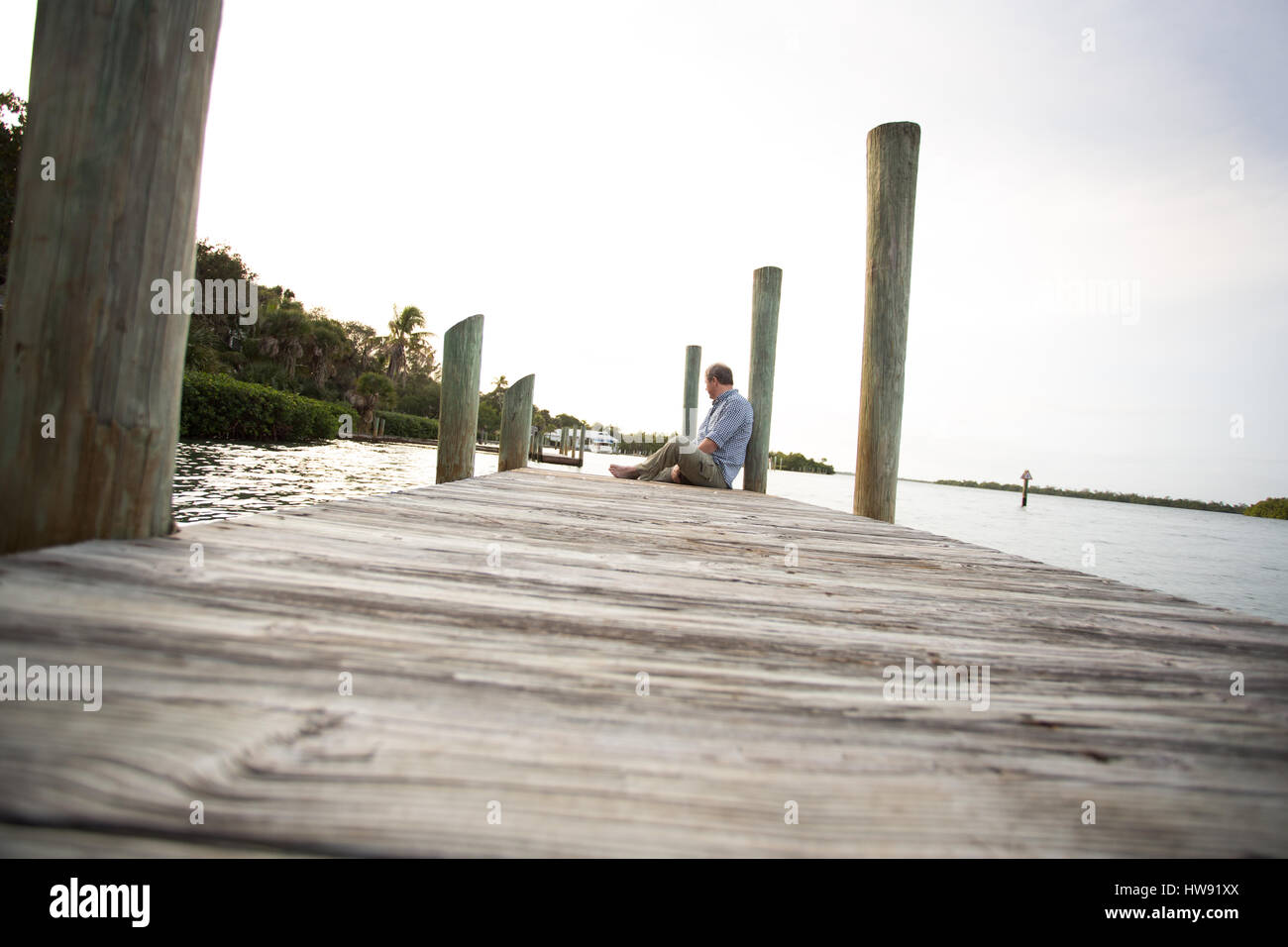 Man on dock in Cabbage Key Florida Stock Photo