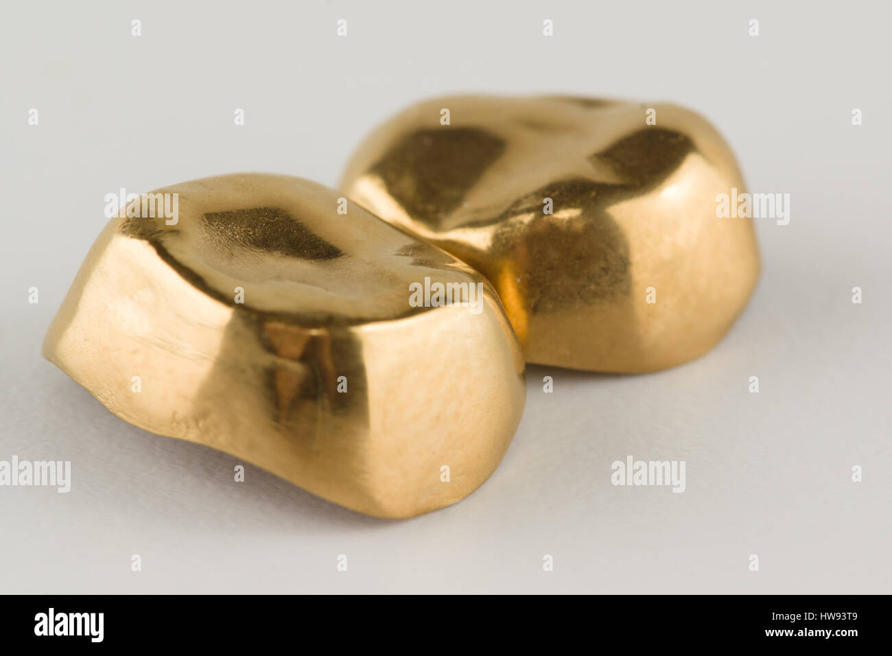 steel crowns with yellow coated with titanium nitride Stock Photo Alamy
