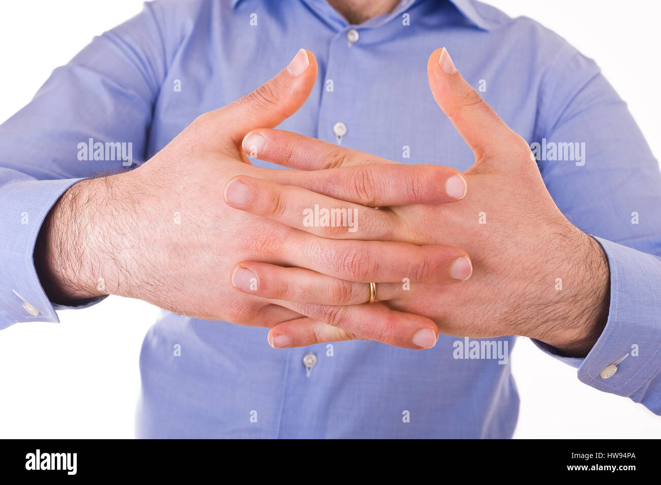 Young businessman crossing his hands Stock Photo Alamy