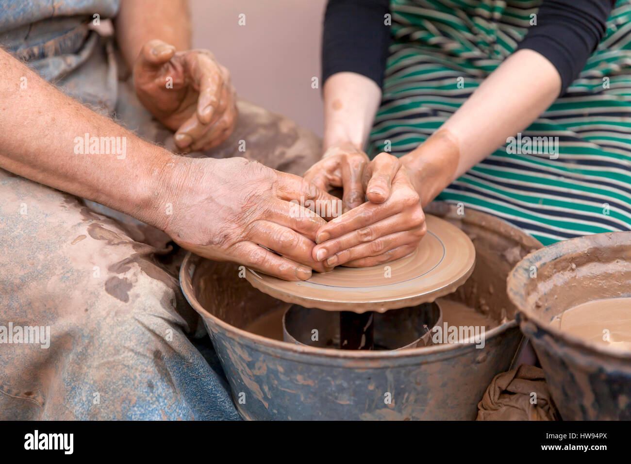 Pottery making, close up on hands Stock Photo