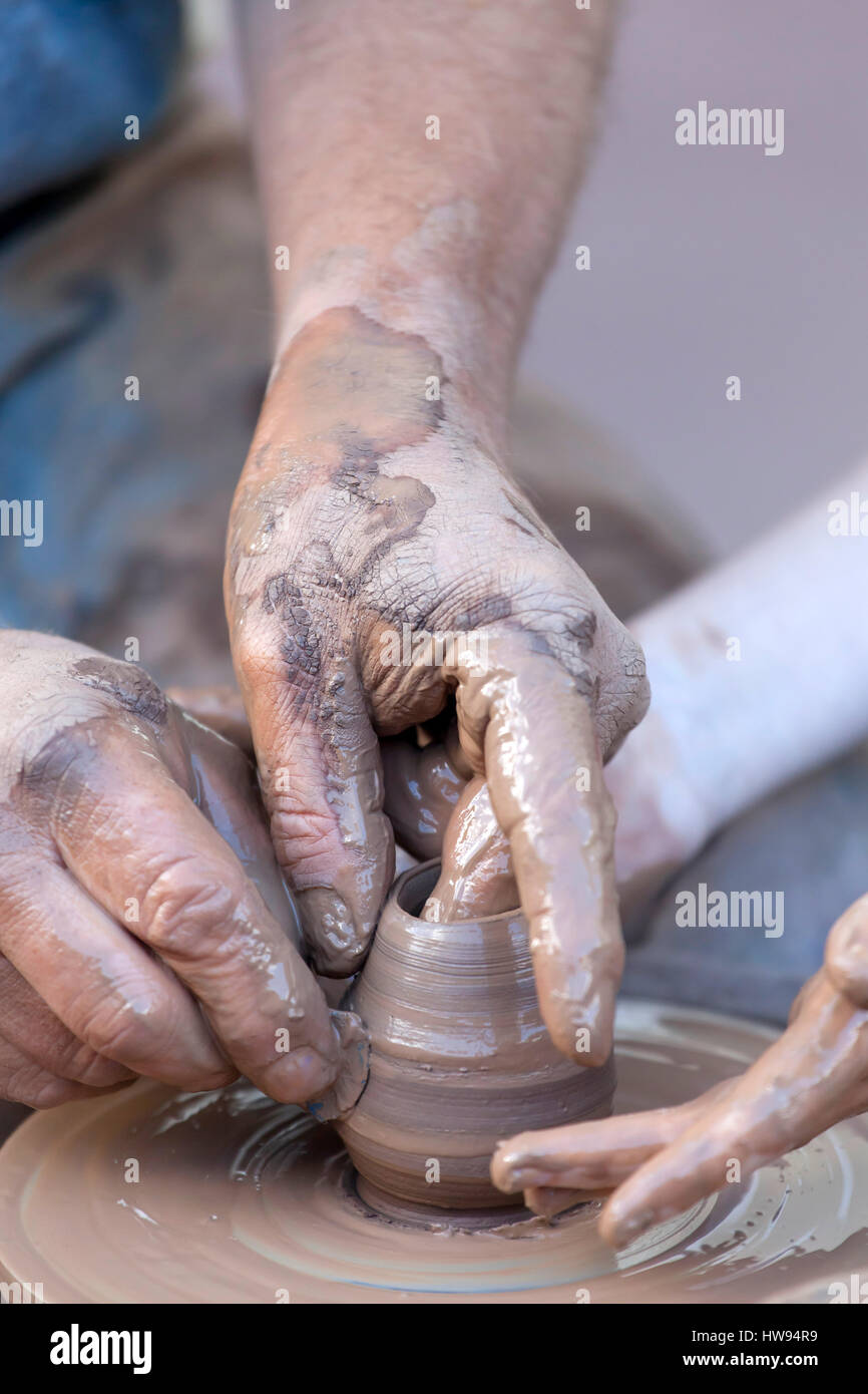 Pottery making, close up on hands Stock Photo