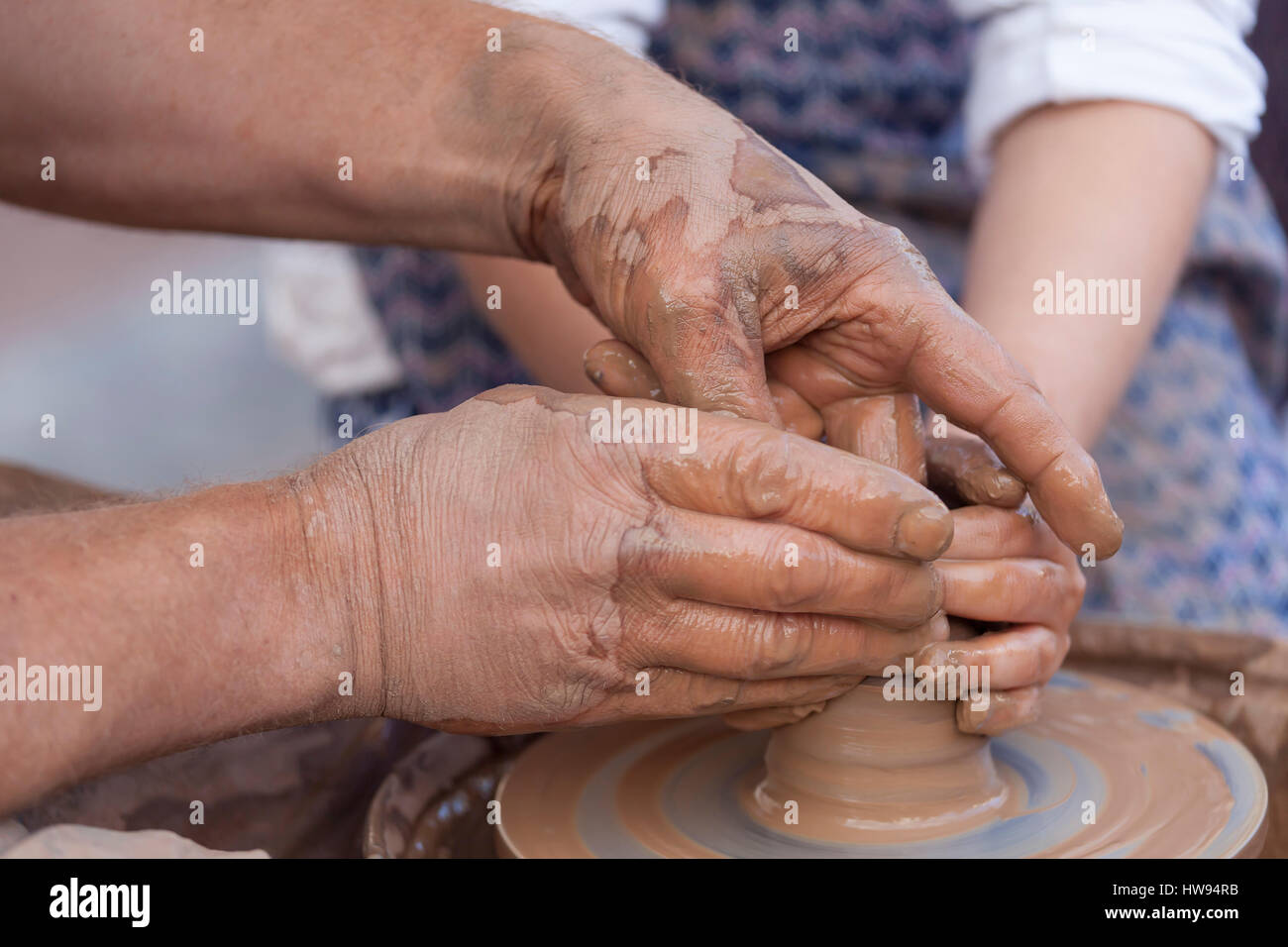 Pottery making, close up on hands Stock Photo