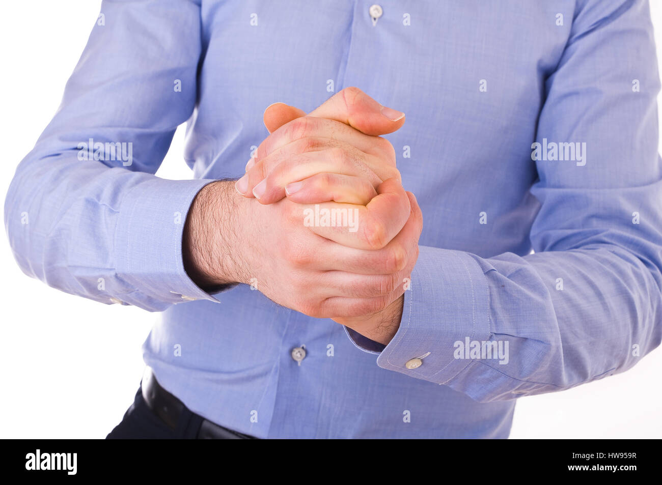 Businessman rubbing his hands together Stock Photo Alamy