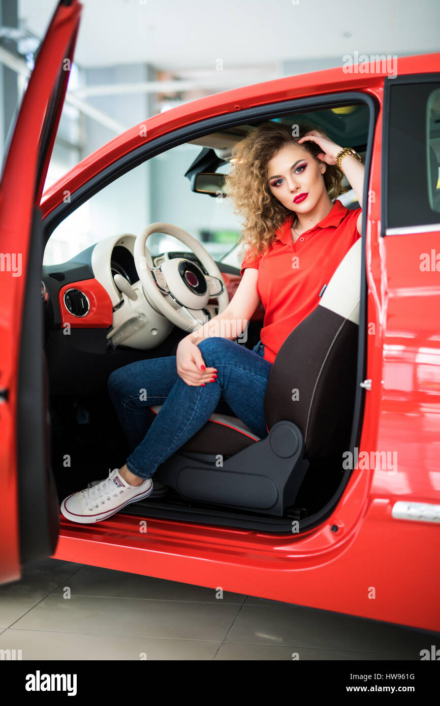 view of a beautiful woman next to sports car on a fashion pose, Stock  Photo, Picture And Low Budget Royalty Free Image. Pic. ESY-005655850 |  agefotostock