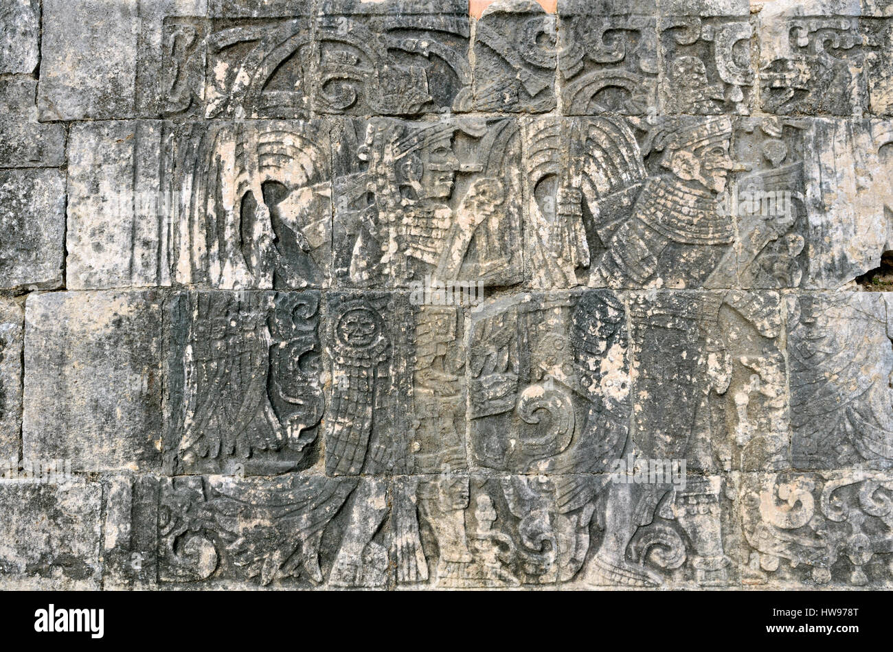 Bas-relief with human representations and symbols, ball court, historic Mayan city of Chichen Itza, Piste, Yucatan, Mexico Stock Photo