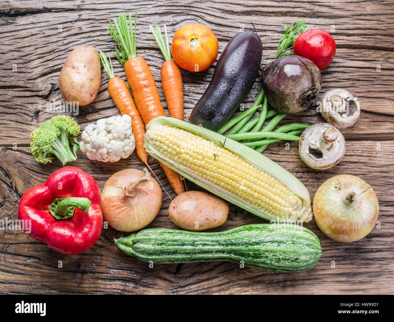Fresh organic vegetables on the wooden table. Top view Stock Photo - Alamy