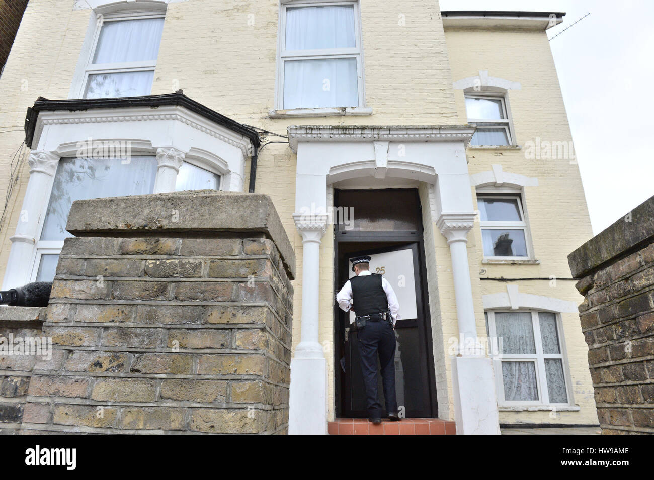 Police officers enter the scene in Wilberforce Road, near Finsbury Park