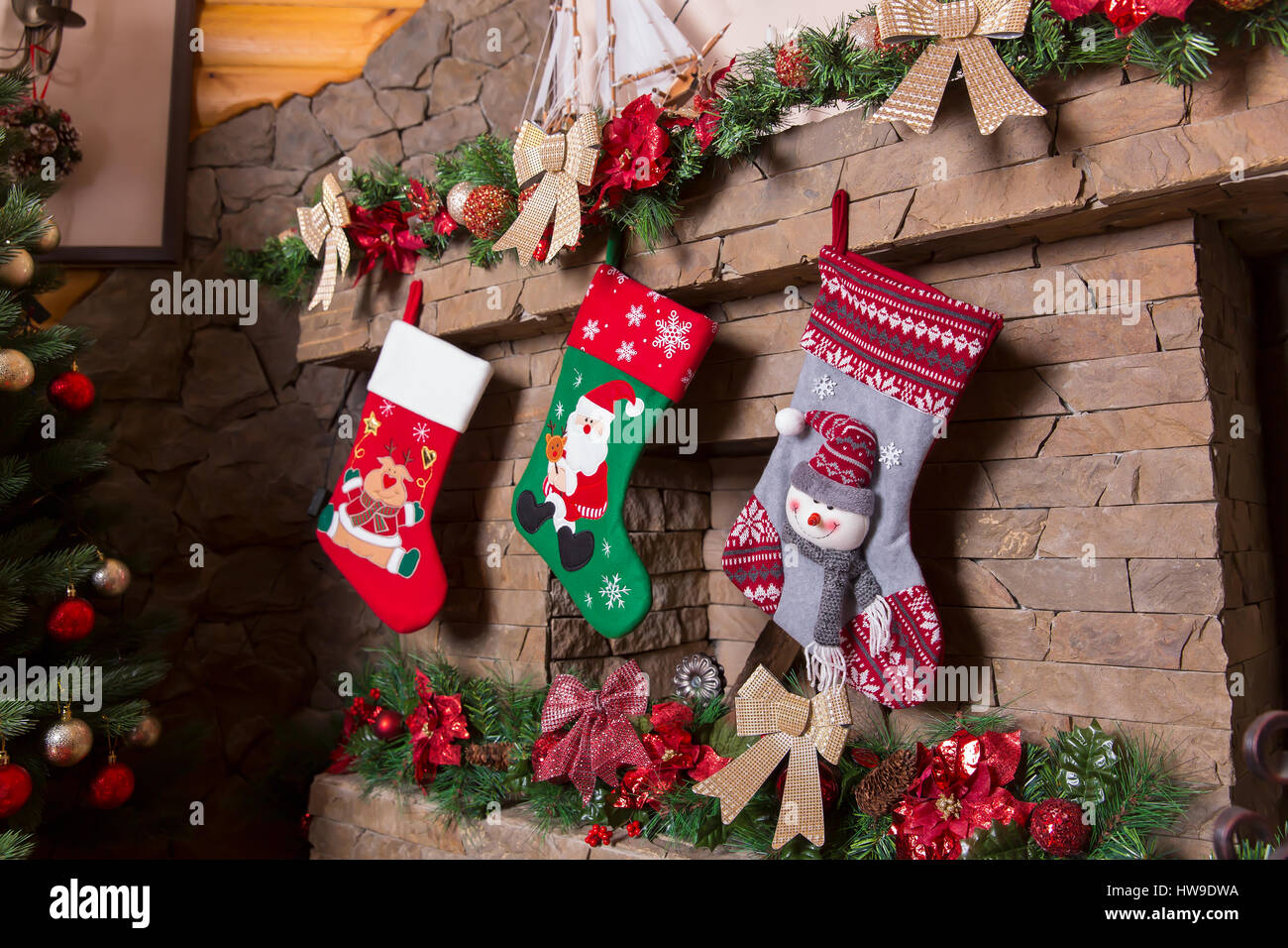 Stone Fireplace Decorated With Christmas Stockings Xmas Tree And