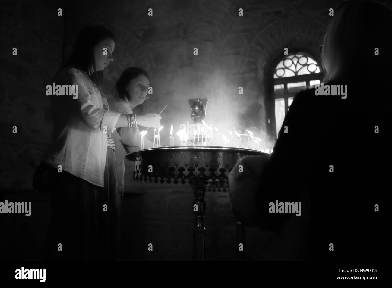 Meteora monastery candle lighting in Greece Stock Photo Alamy