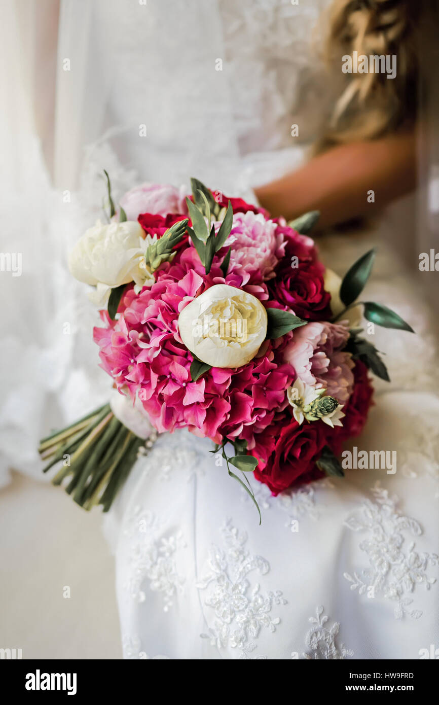 Bride holding delicate marriage bouquet Stock Photo Alamy