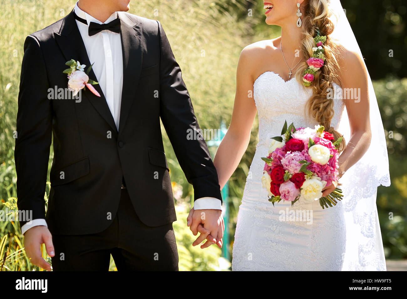 Young wedding couple. Groom and bride together. Stock Photo
