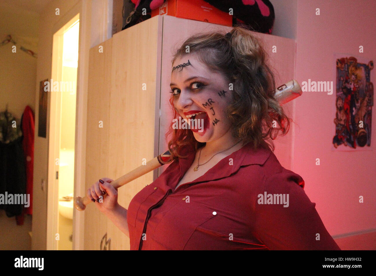 4/12/16, Pellet Street, Cardiff, Wales. In flat flat 1502 Francesca Wood age 20, cosplaying as the comic book charactor “Harley Quinn”. Stock Photo