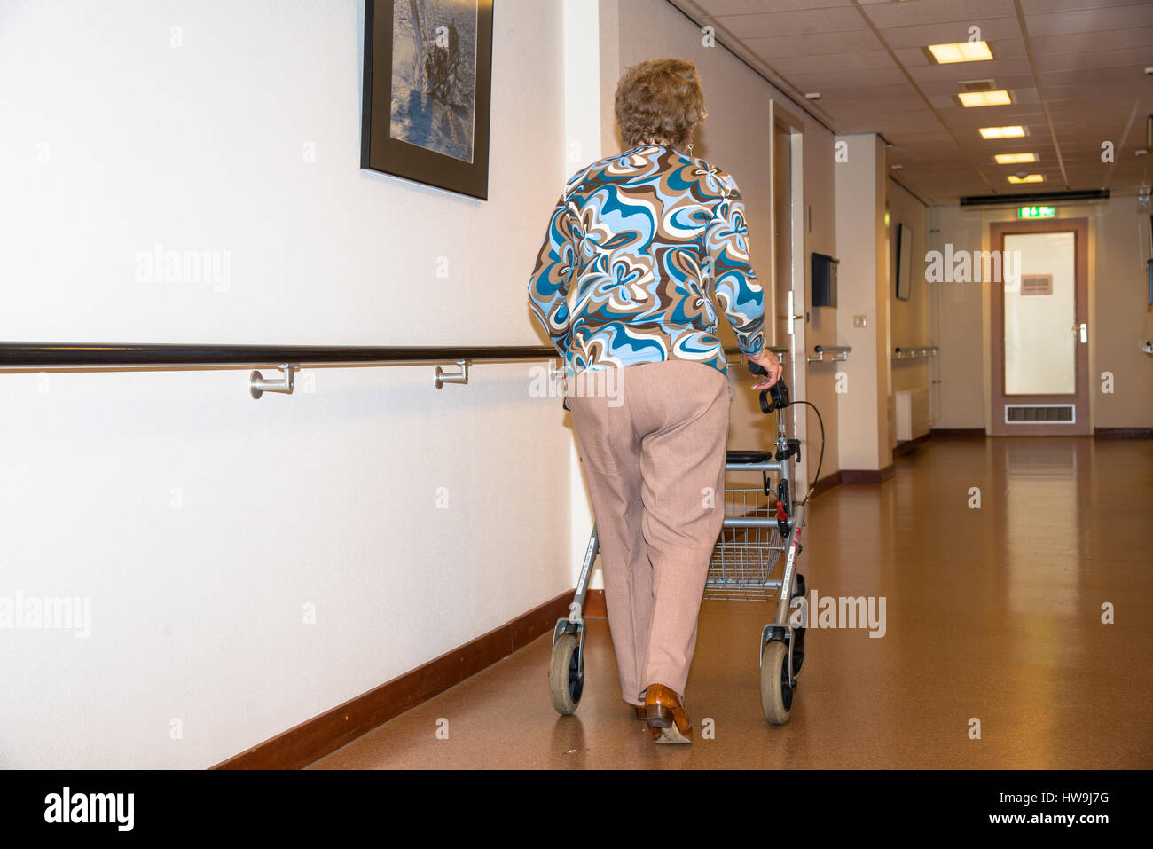 older woman with walking aid at house for the elderly Stock Photo Alamy