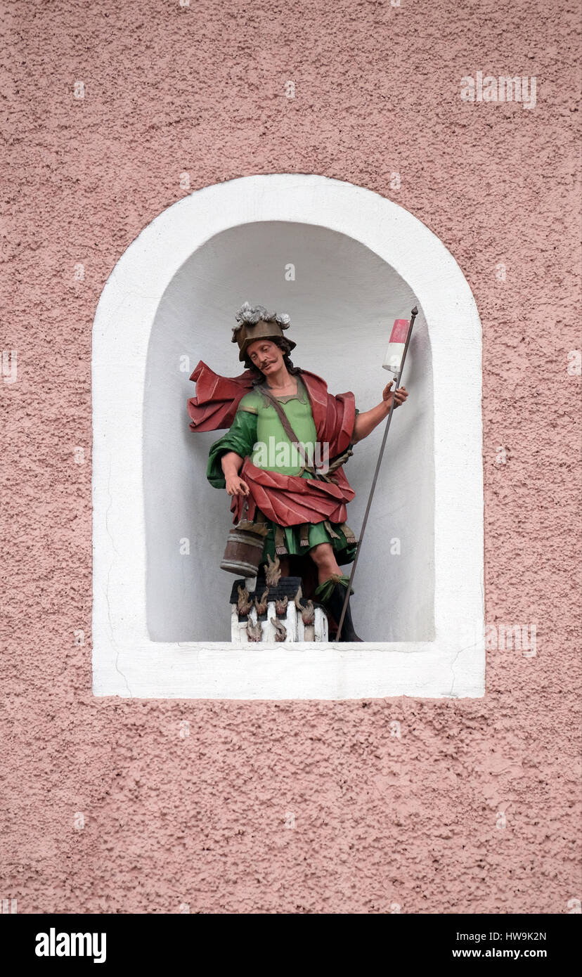 Saint Florian statue on the facade of the house in Hallein, Austria on December 14, 2014. Stock Photo